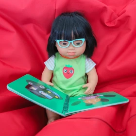 Lunettes turquoise pour poupée inclusive
