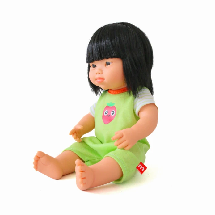 Pyjama vert pour poupée inclusive