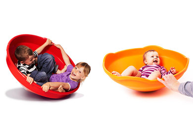 Toupie géante, petite toupie et stimulation vestibulaire passive